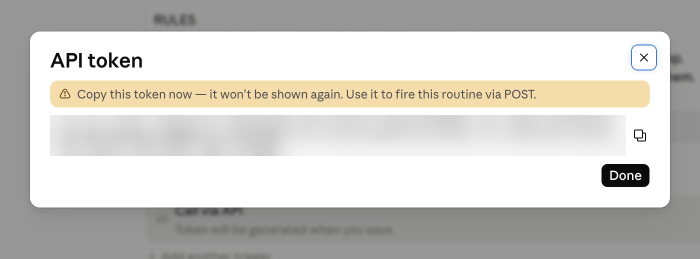 API token dialog shown after saving the routine, with the token blurred